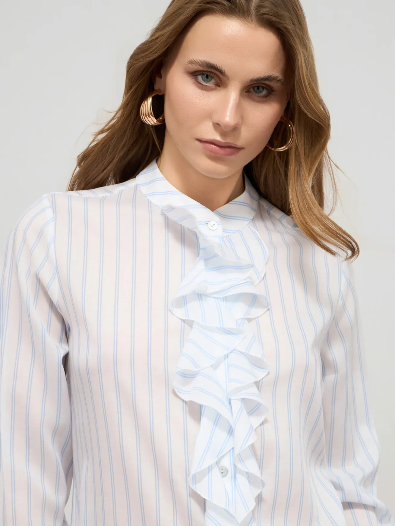 Camicia a righe con volant