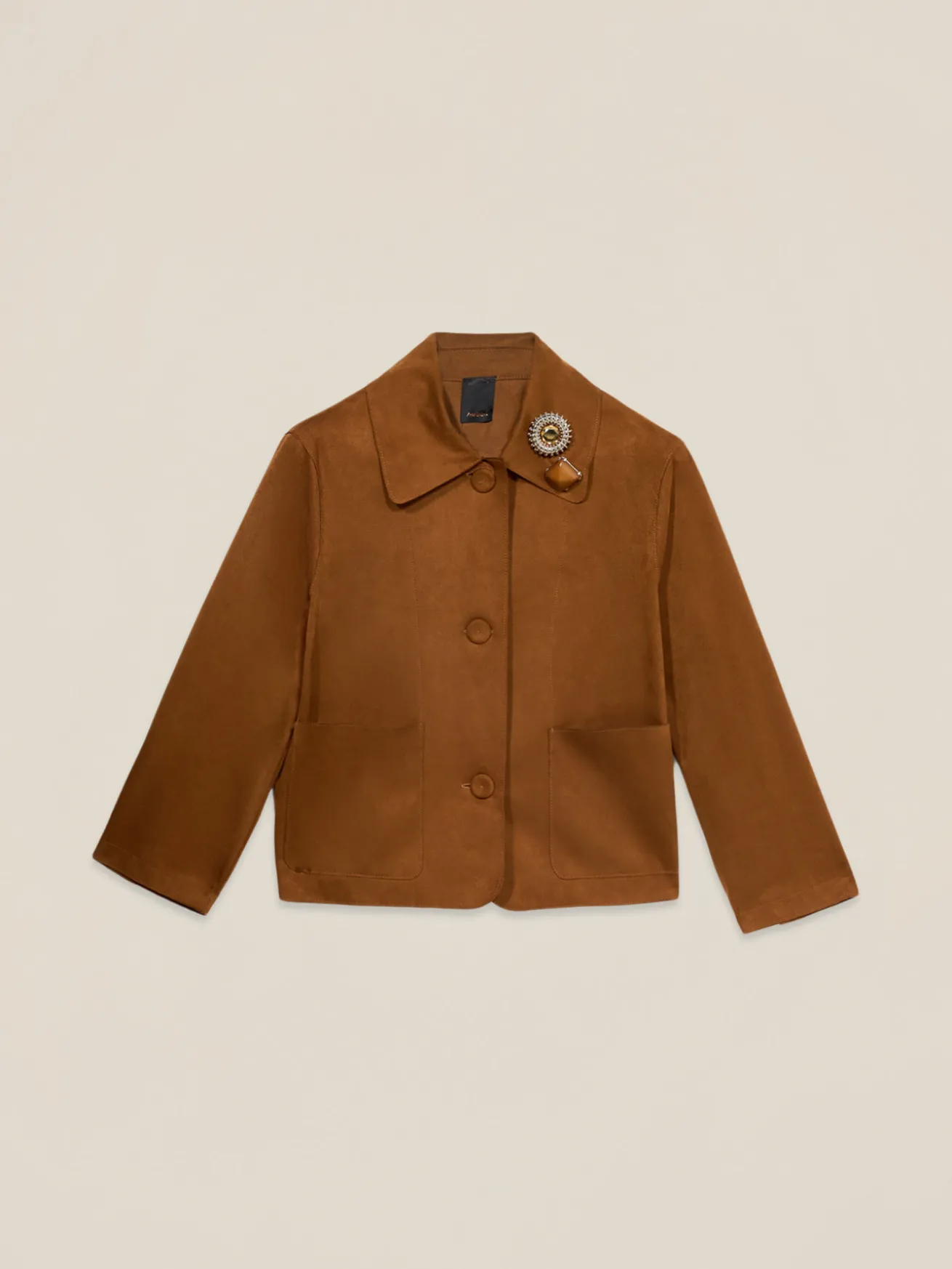 Giacca boxy con spilla gioiello
