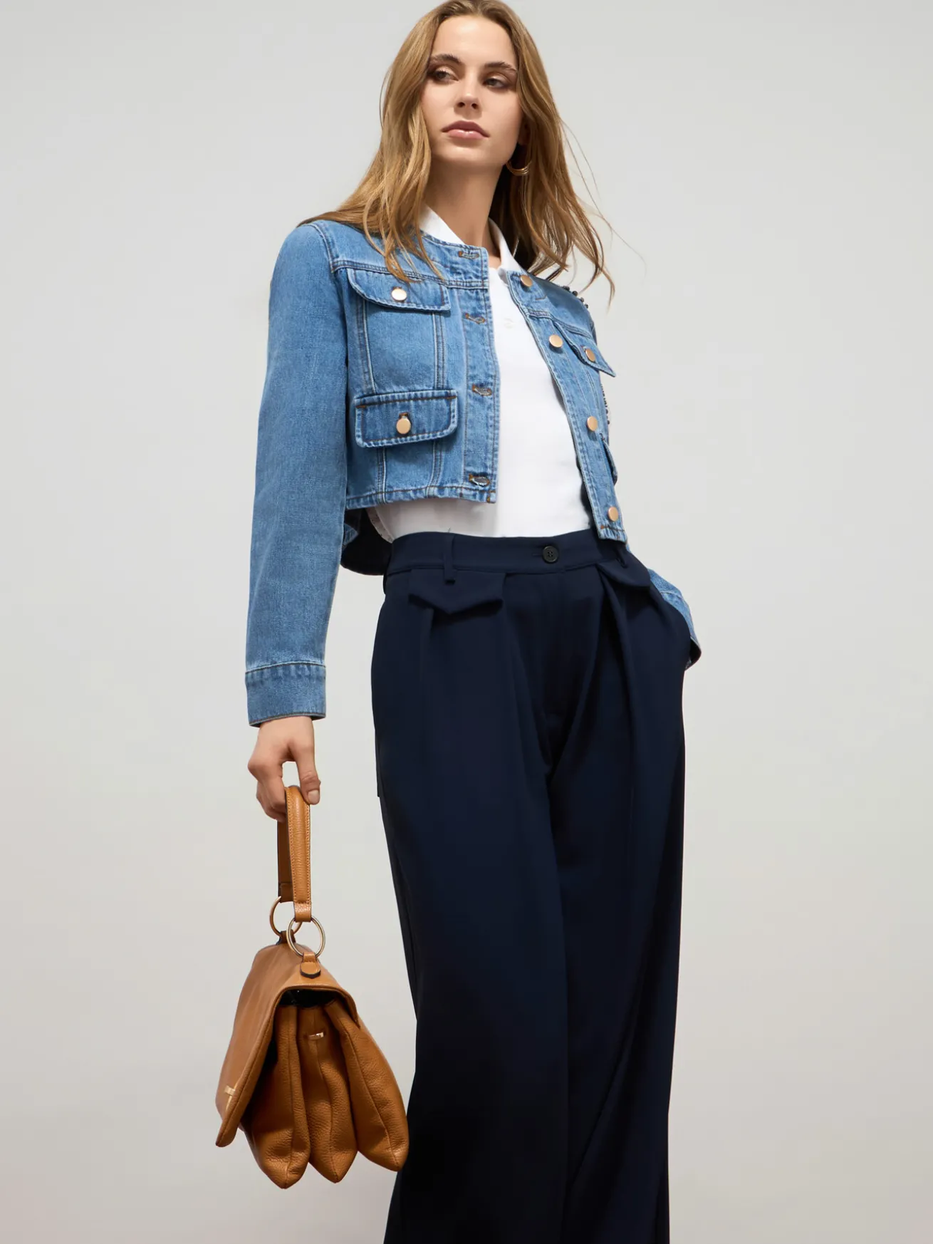 Giubbotto in denim con applicazioni