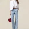 Jeans a palazzo con castoni