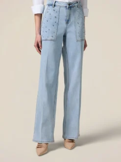 Jeans a palazzo con castoni
