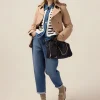Jeans boyslim con bottone gioiello