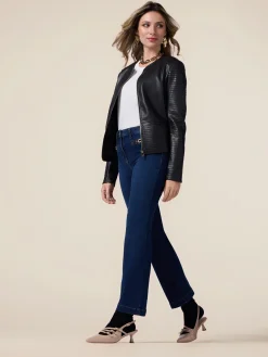 Jeans kick flare con fibbie metalliche