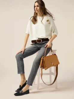 Jeans regular con borchie decorative