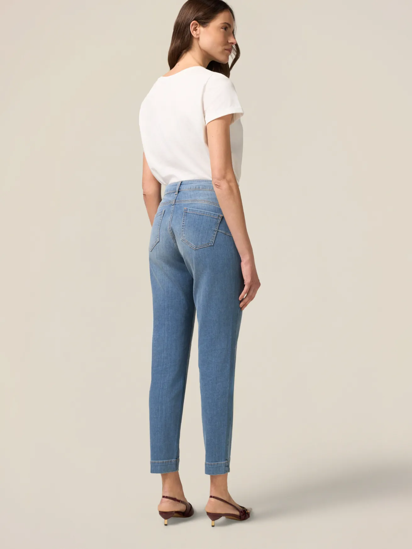 Jeans skinny push up con dettaglio catena