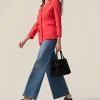Jeans wide leg con dettaglio catena