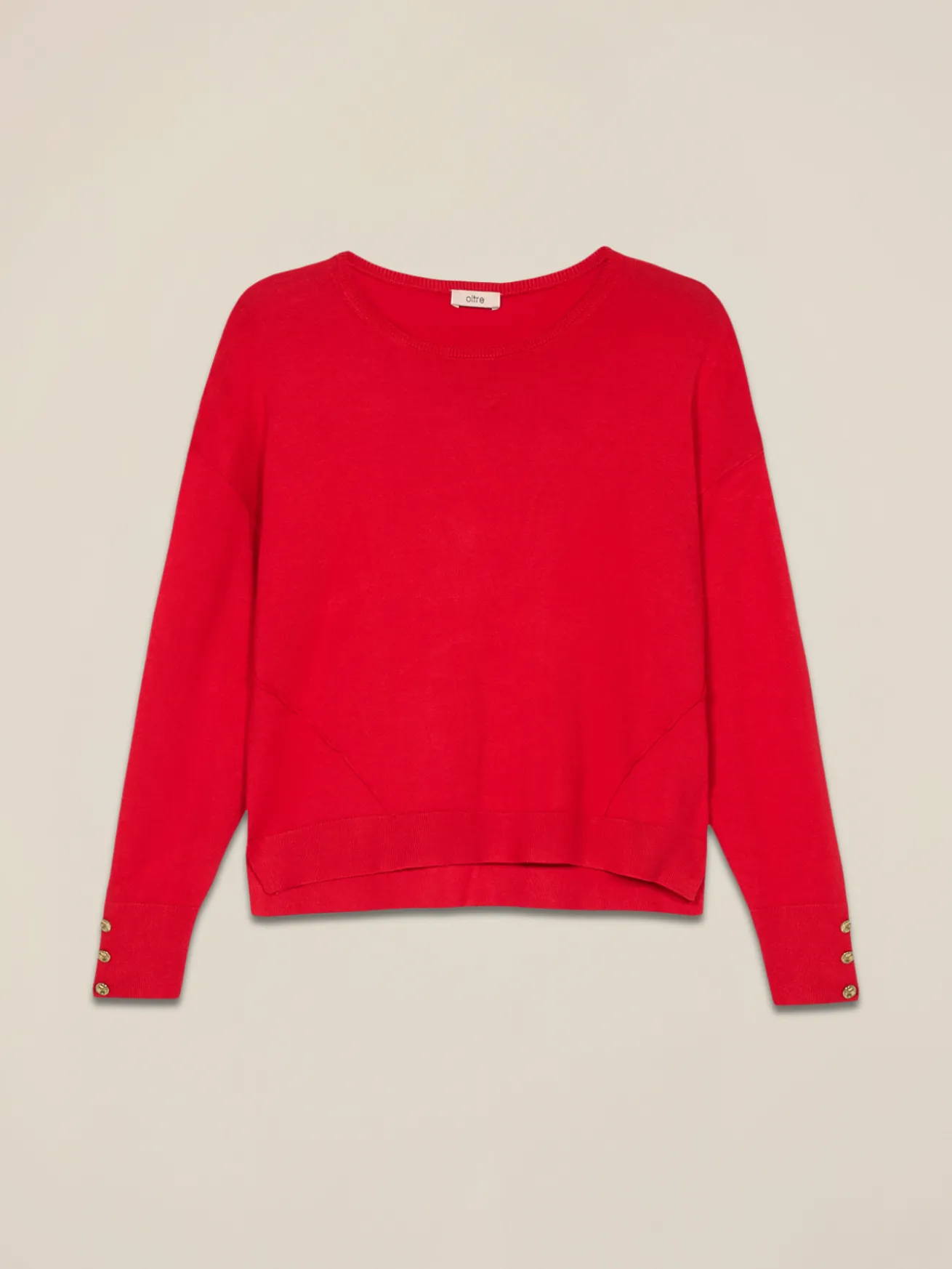 Maglia boxy con bottoni sul fondo maniche
