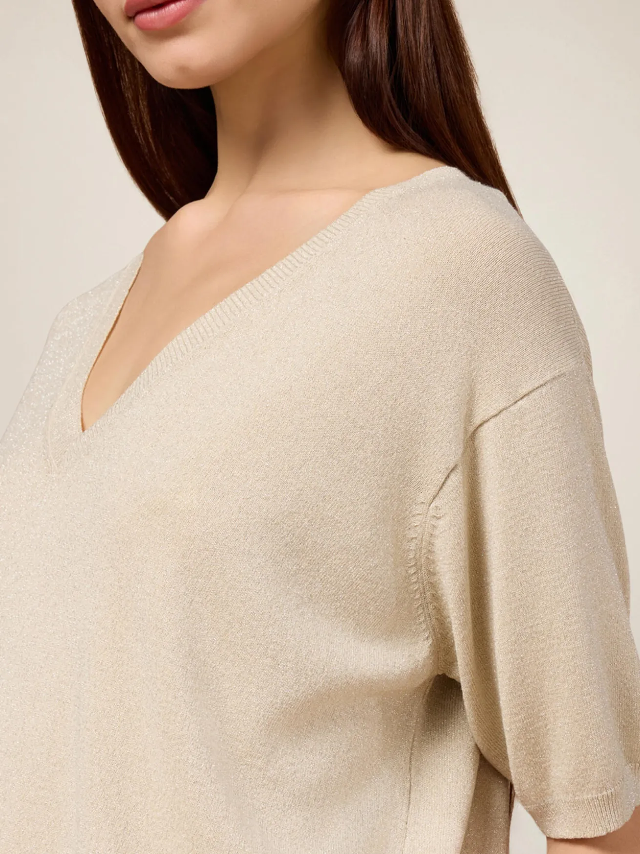 Maglia lurex con scollo a V