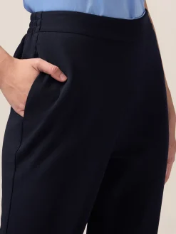Pantaloni joggers in tessuto scuba crêpe