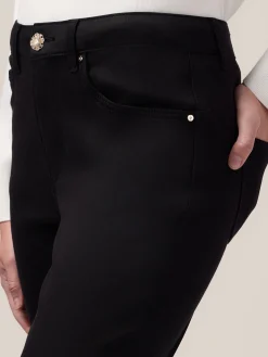 Pantaloni skinny in cotone e tencel con bottone gioiello