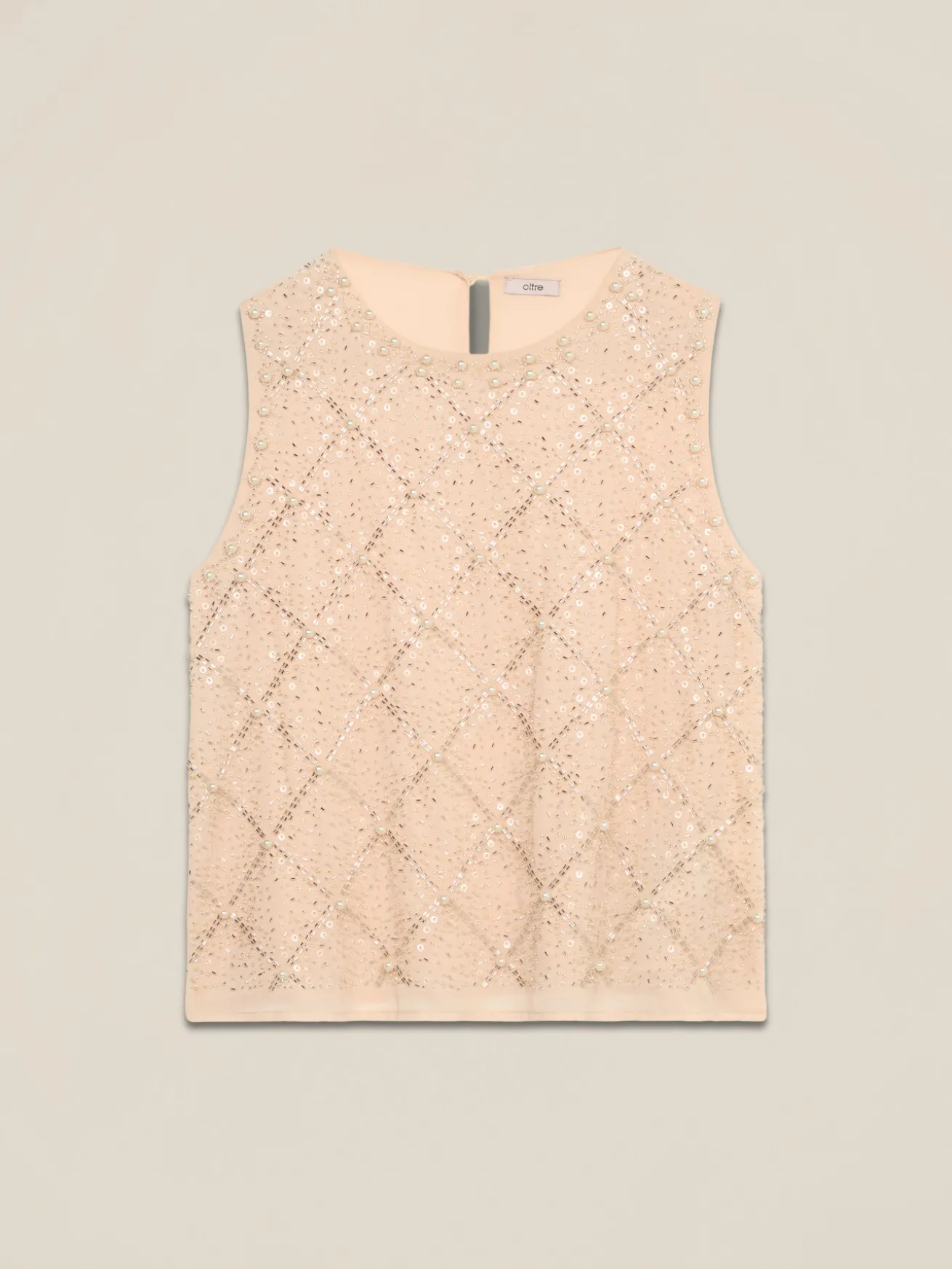 Top in georgette con applicazioni