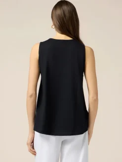 Top in jersey con applicazioni floreali
