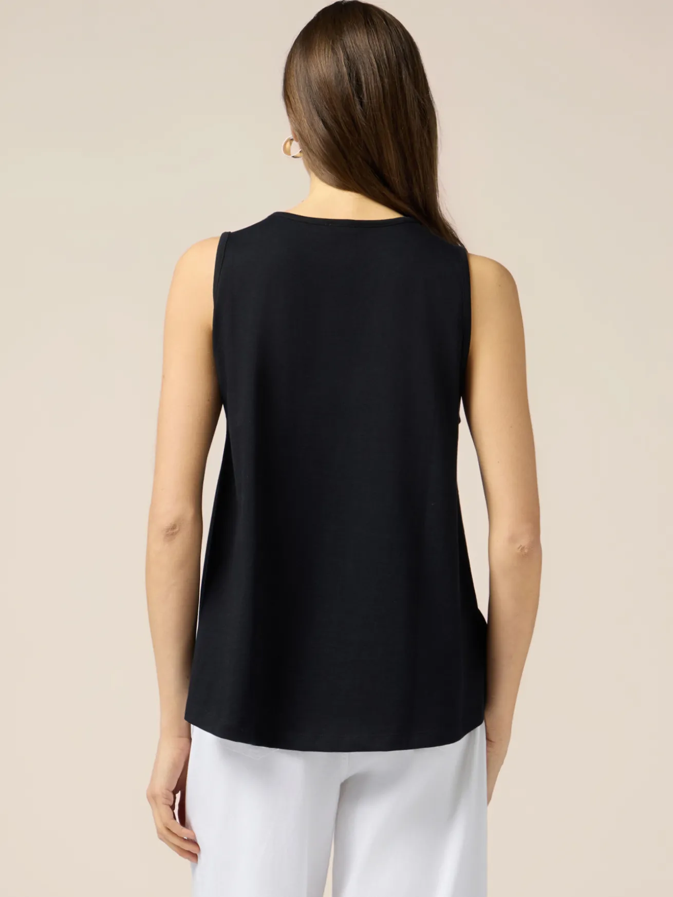 Top in jersey con applicazioni floreali