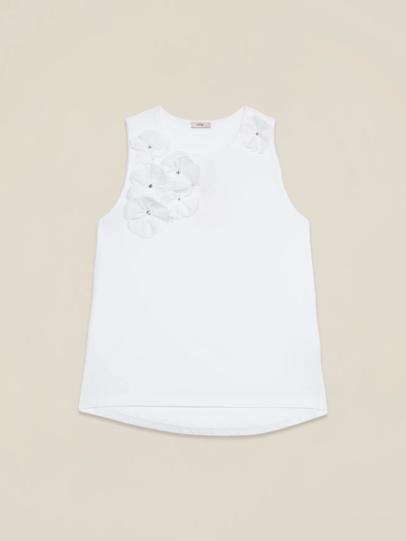 Top in jersey con applicazioni floreali