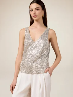 Top in tulle con paillettes