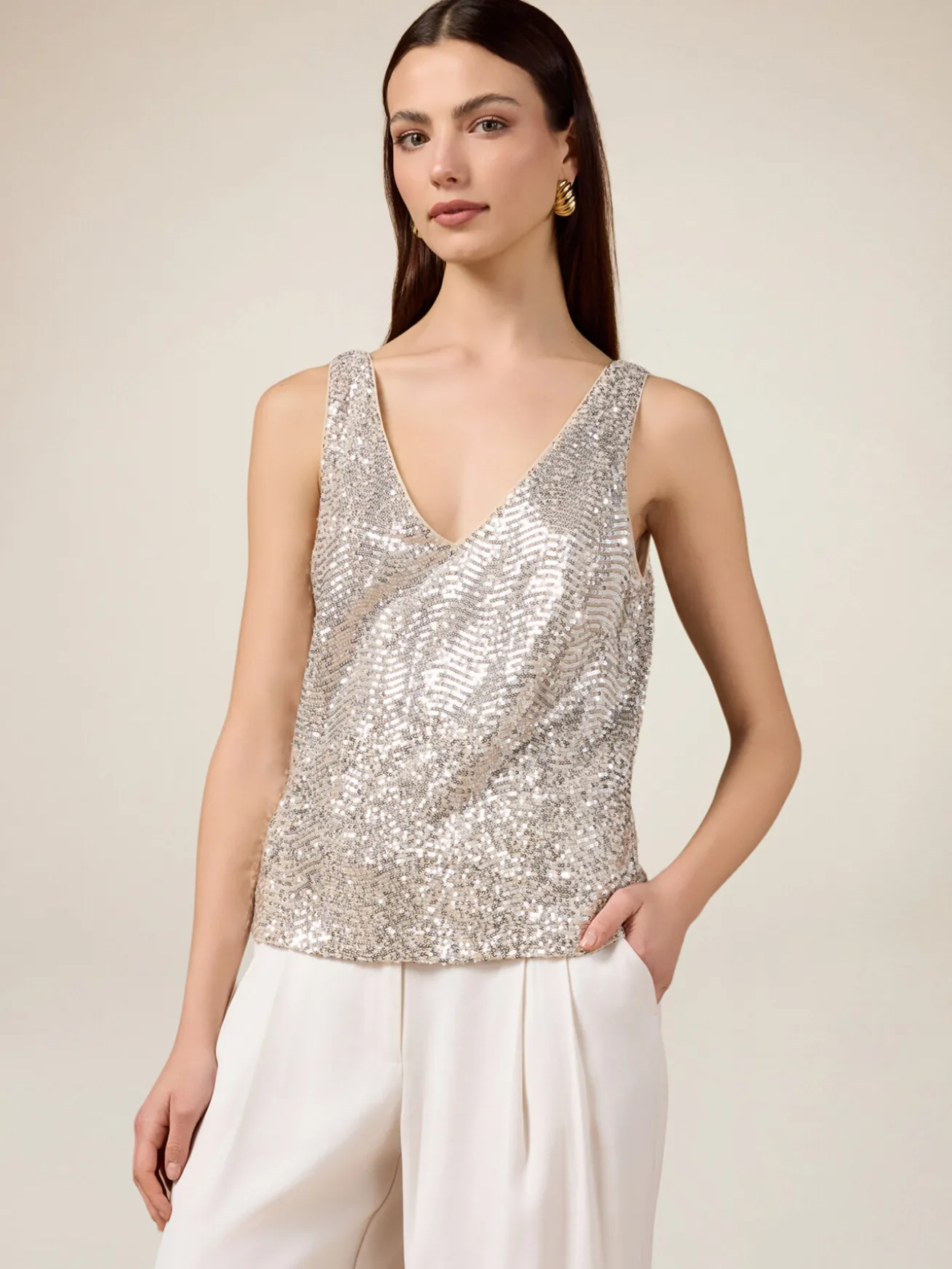 Top in tulle con paillettes
