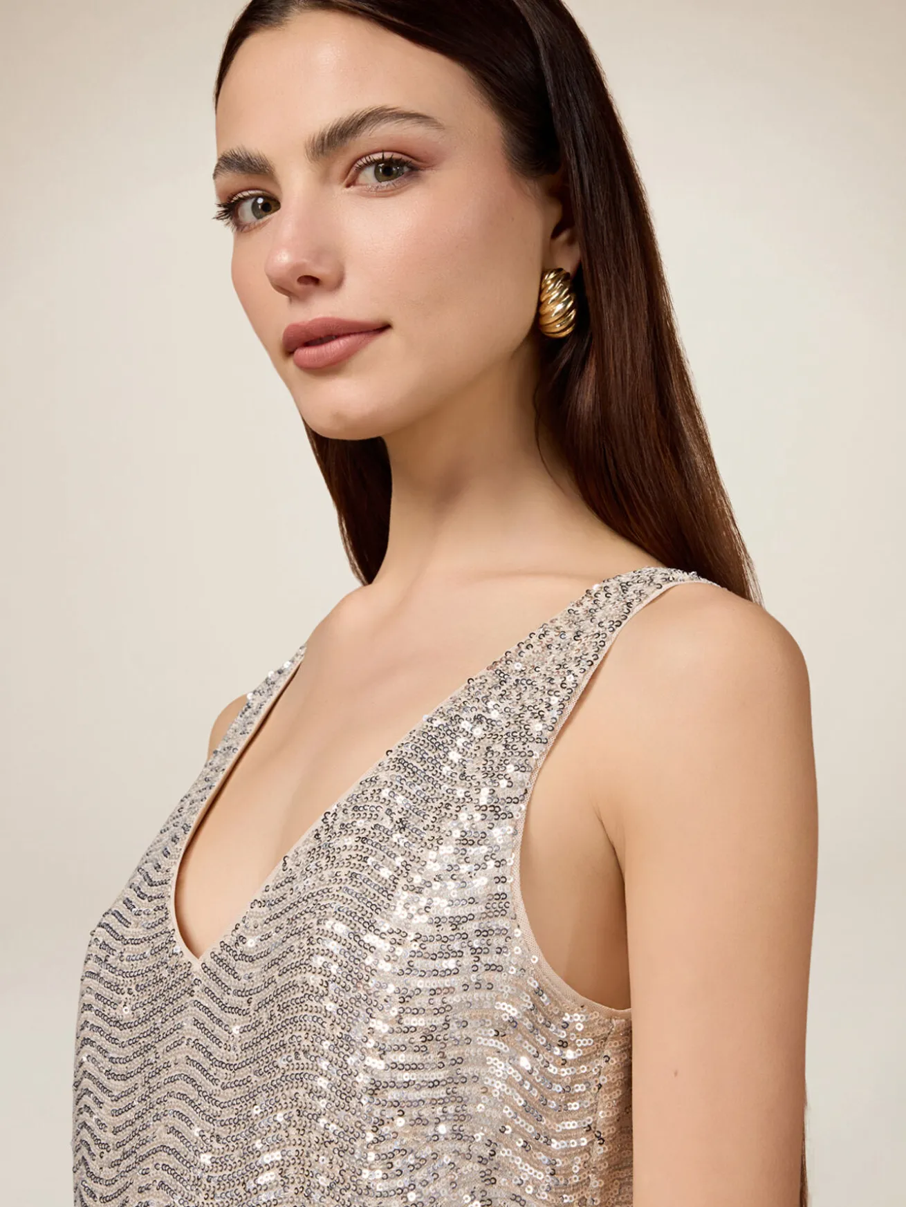 Top in tulle con paillettes