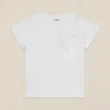 T-shirt con spilla a fiore