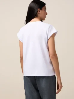 T-shirt con spilla a fiore