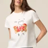 T-shirt con stampa e applicazioni