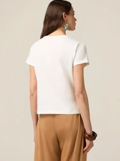 T-shirt in cotone con stampa e applicazioni
